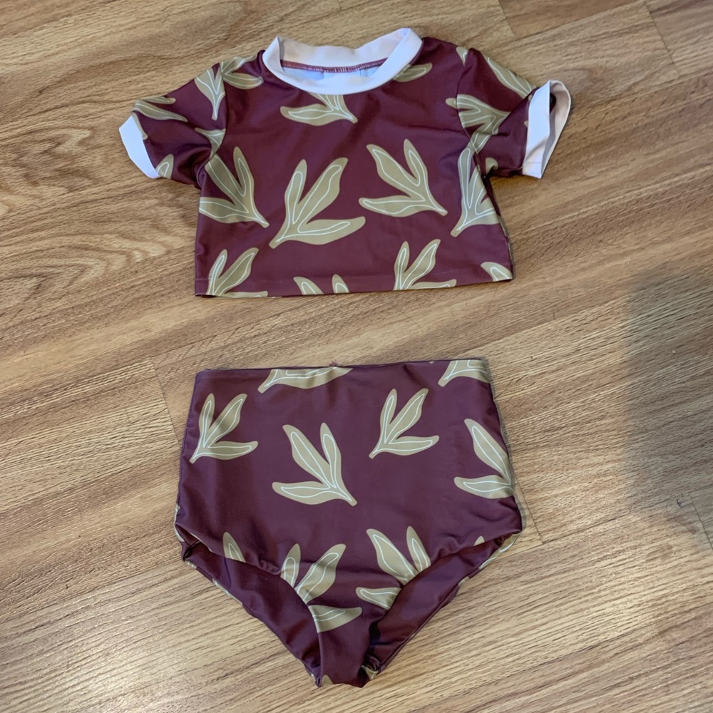 Girls double lined of one sea swim. Size 9/10